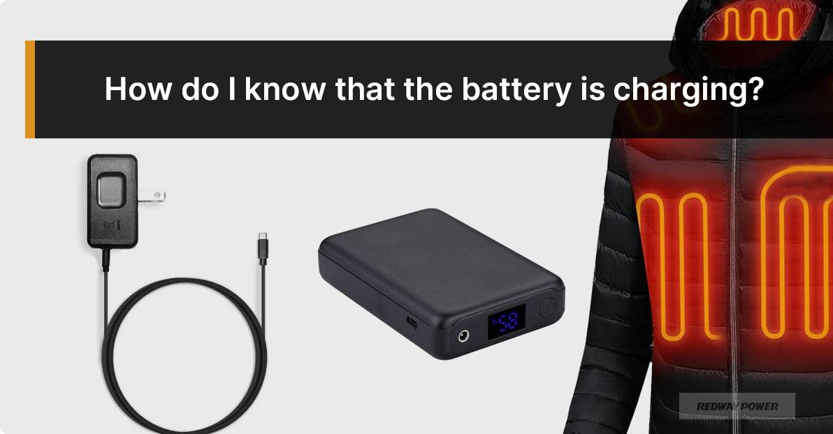 How do I know that the heated apparel battery is charging?